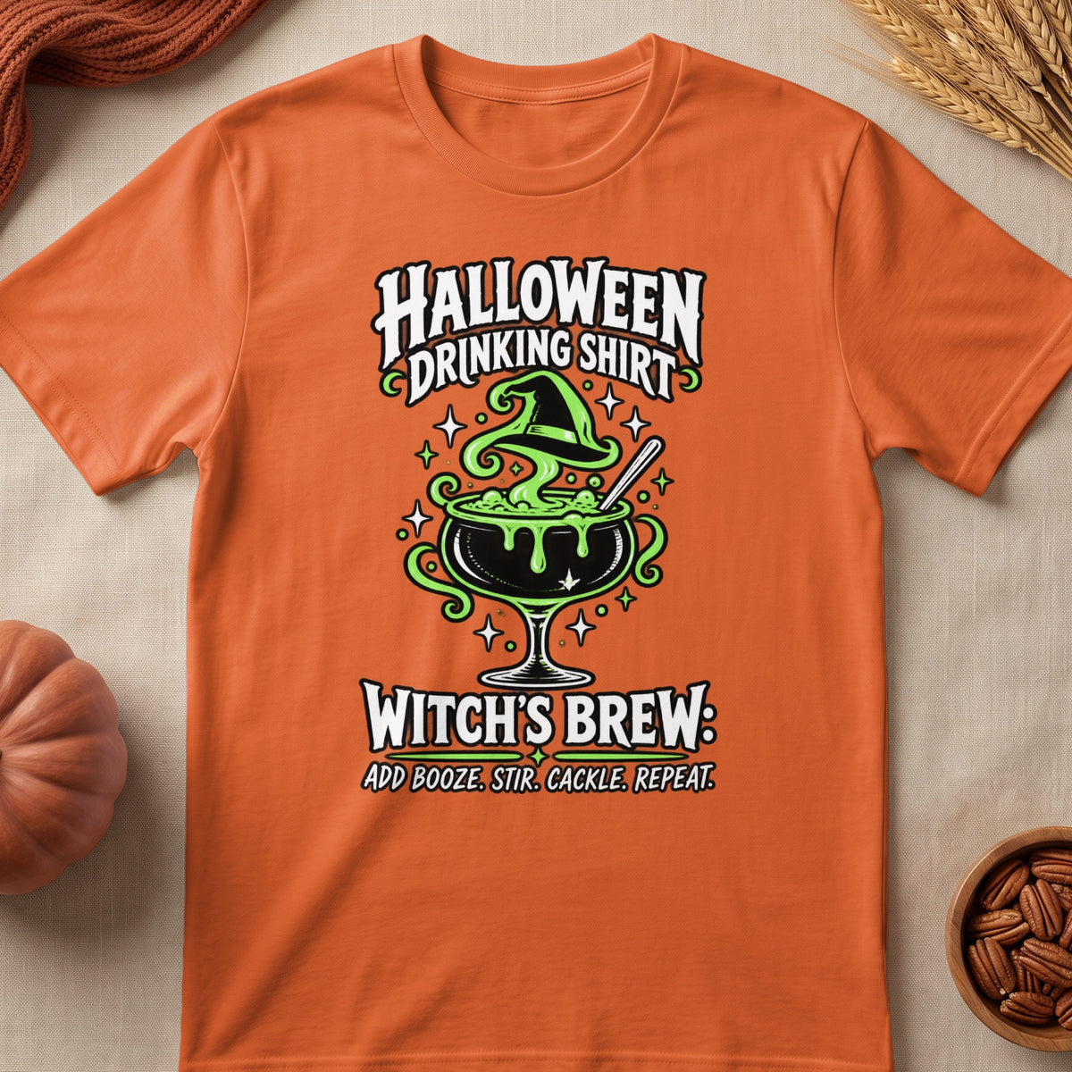Orange shirt with Halloween graphic: "Halloween Drinking Shirt Witch's Brew: Add Booze. Stir. Cackle. Repeat."
