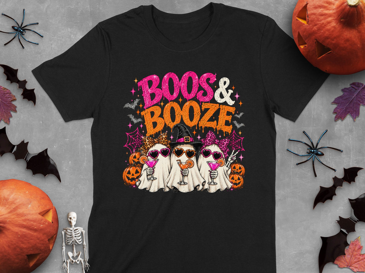 Black t-shirt with "Boos & Booze" graphic featuring three ghosts, pumpkins, and Halloween decor.